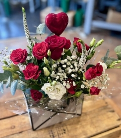 Envelope red rose arrangement